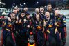 ABU DHABI, UNITED ARAB EMIRATES - NOVEMBER 26: Race winner Max Verstappen of the Netherlands and Oracle Red Bull Racing poses for a photo with his team in parc ferme during the F1 Grand Prix of Abu Dhabi at Yas Marina Circuit on November 26, 2023 in Abu Dhabi, United Arab Emirates. (Photo by Mark Thompson/Getty Images) // Getty Images / Red Bull Content Pool // SI202311260265 // Usage for editorial use only //